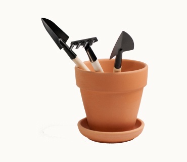 Clay Pot With Shovel